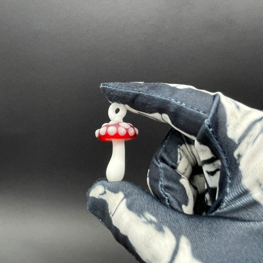 Red mushroom pendant detail view - premium glass art