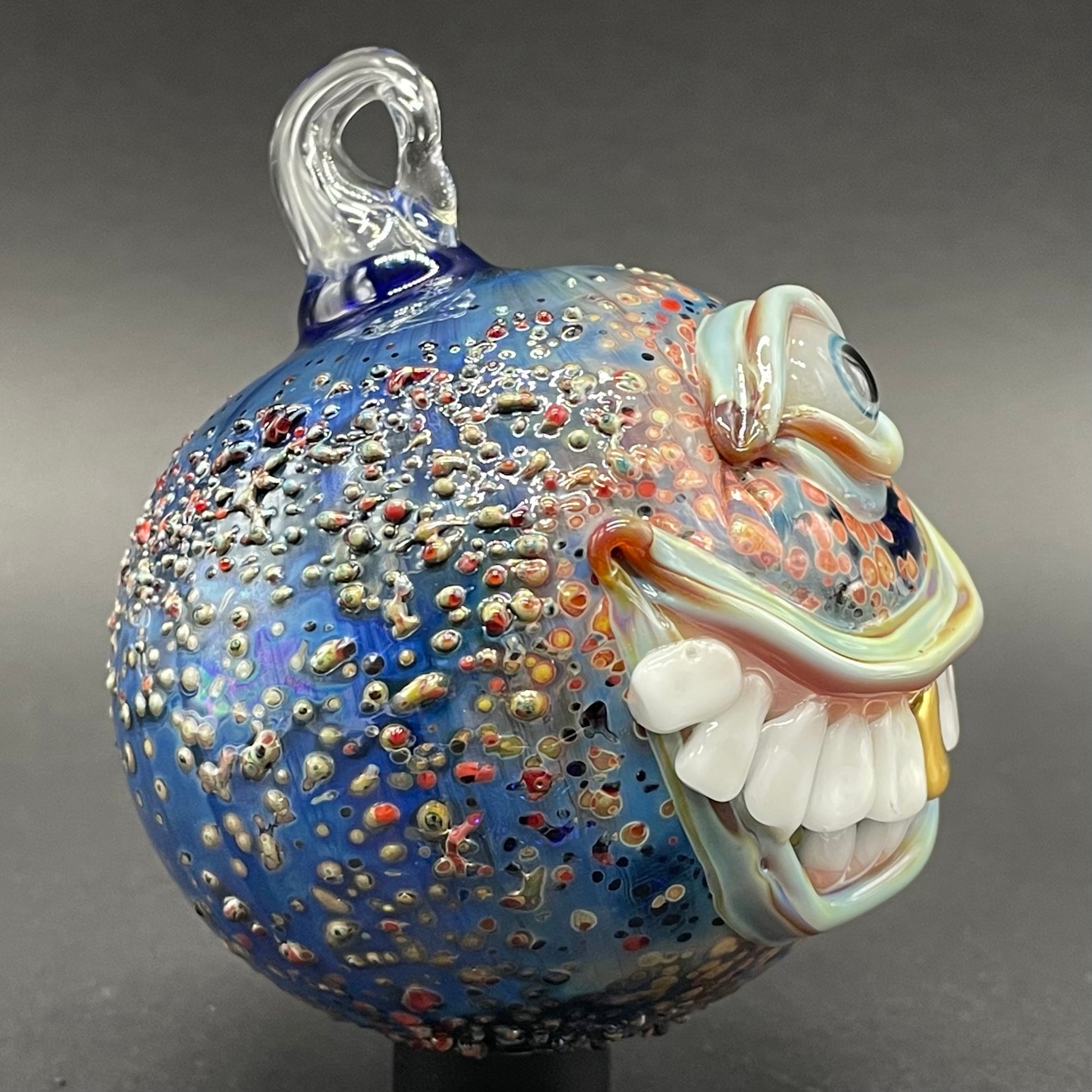 Smiling cyclops ornament craftsmanship - artisan glass work