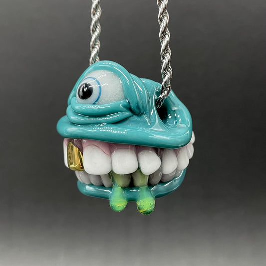 Grinning like a fool glass pendant
