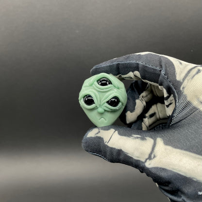 Time manipulating three eye glass alien pendant