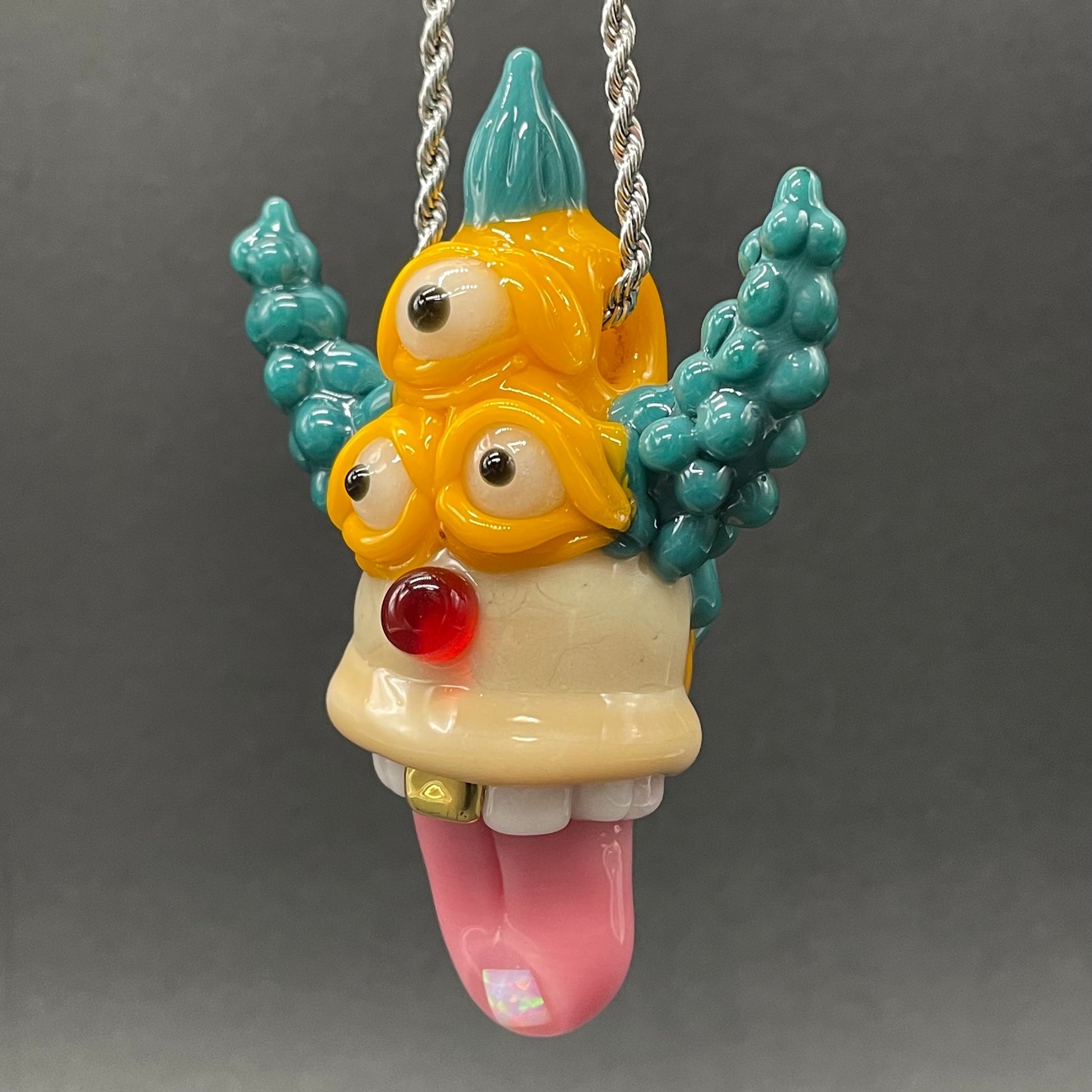 Krusty the Clown handblown glass pendant - Simpsons Krusty clown face with third eye, opal tab accent, white teeth, silver rope chain - Leviathan Glass