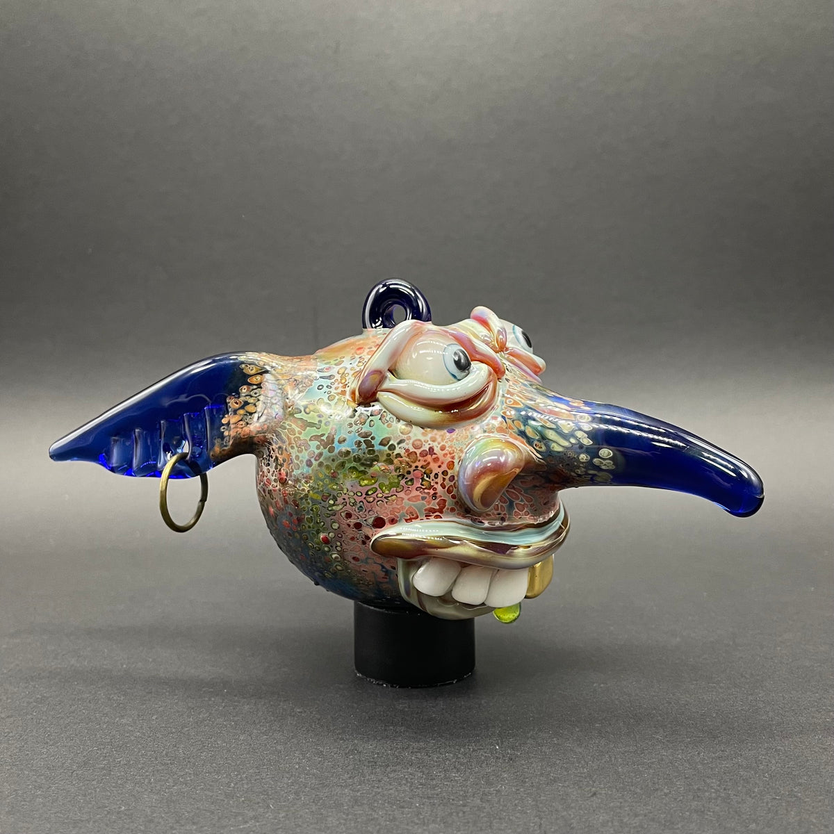 Close-up of Goblin glass ornament - handcrafted glass