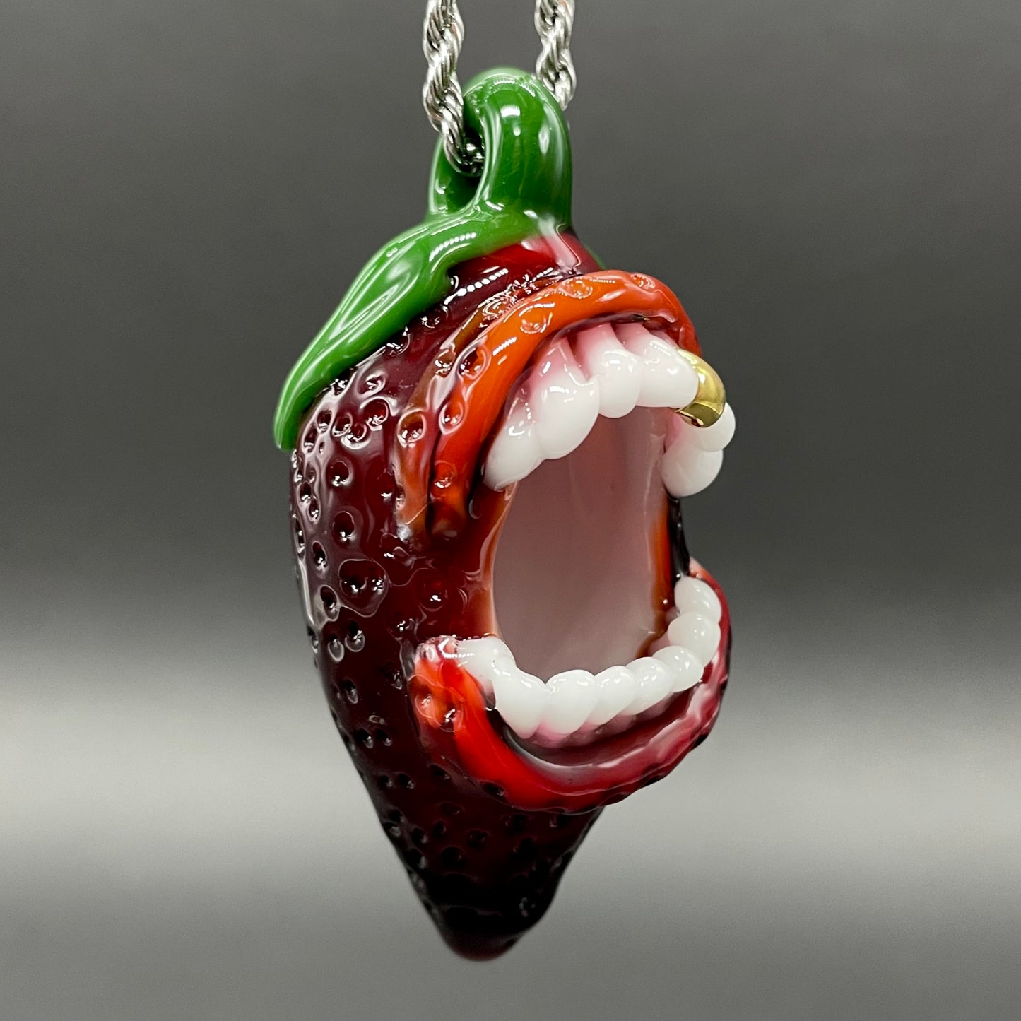 Screaming strawberry glass pendant