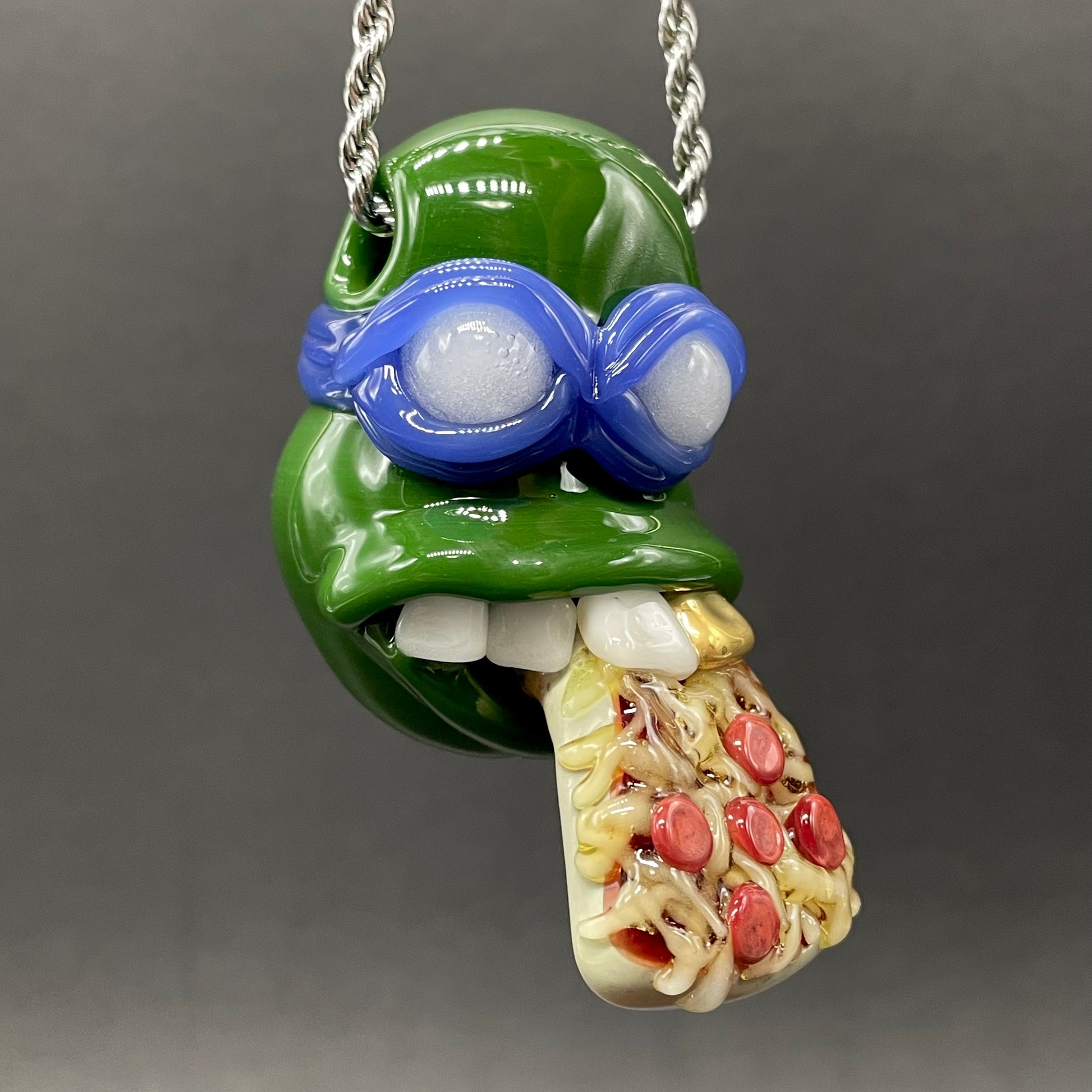 Close-up of Leonardo Ninja TurtleHandblown Pendant, TMNT Inspired Collectible glass necklace - handcrafted glass