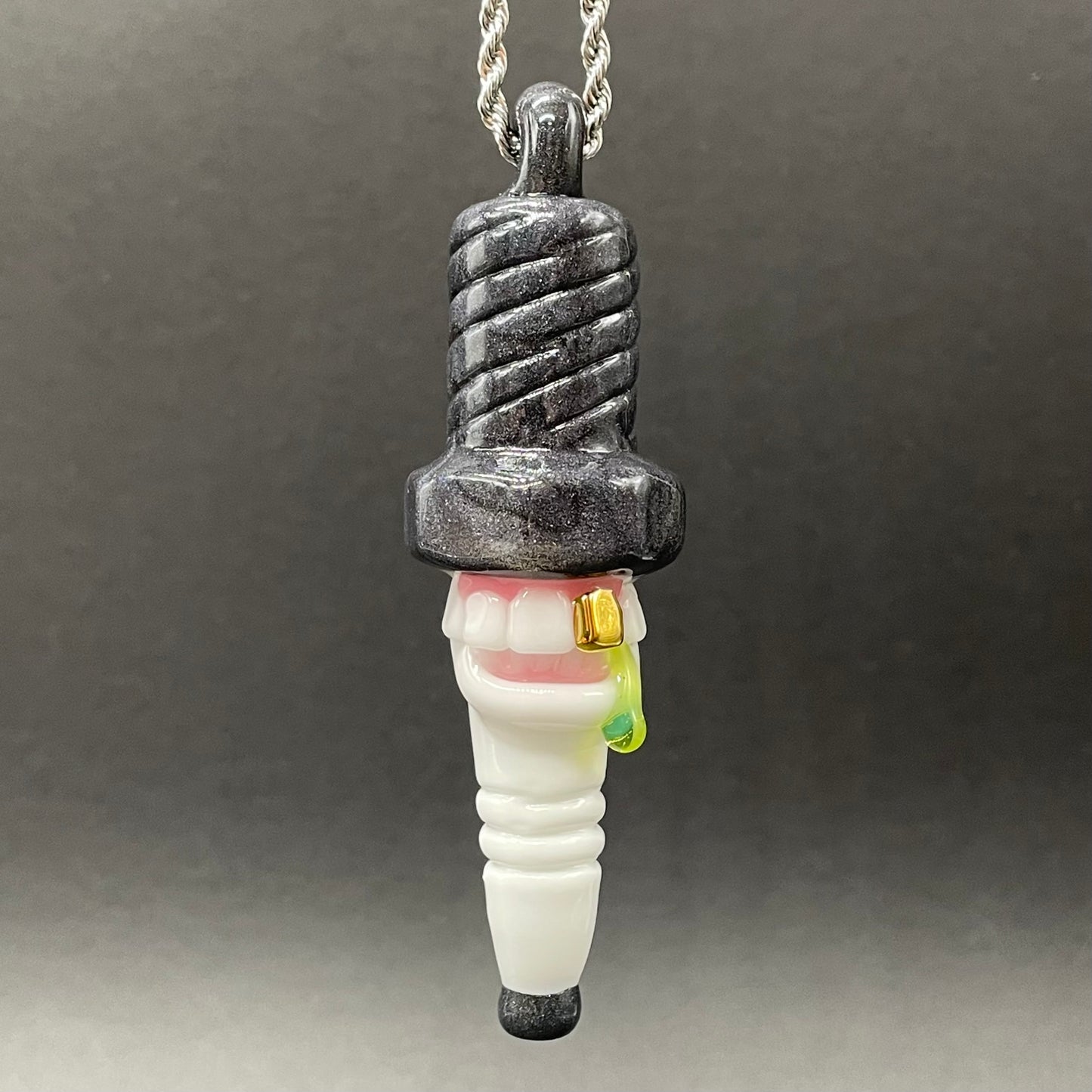 Sparky the Glass spark plug pendant detail view - premium glass art