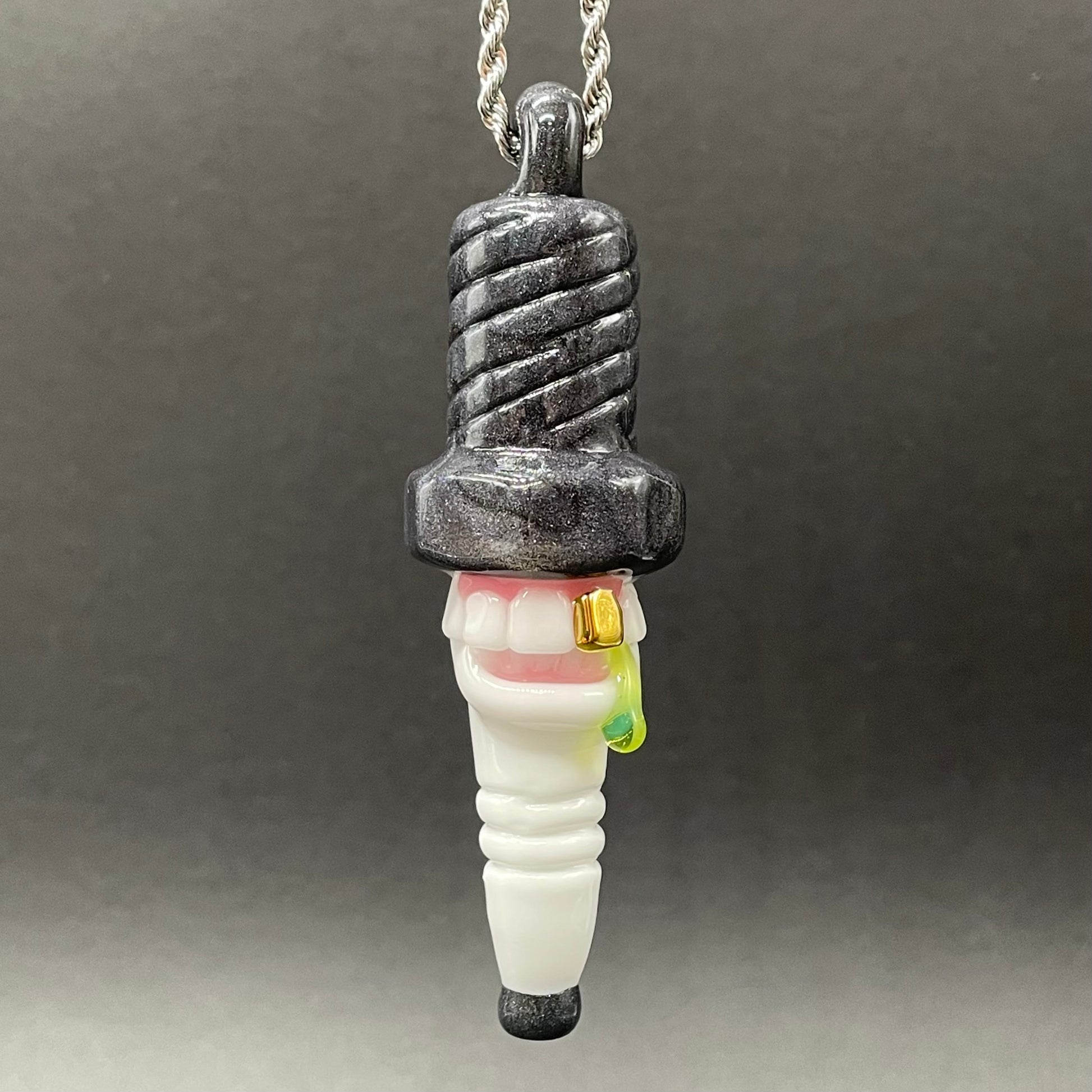 Sparky the Glass spark plug pendant detail view - premium glass art