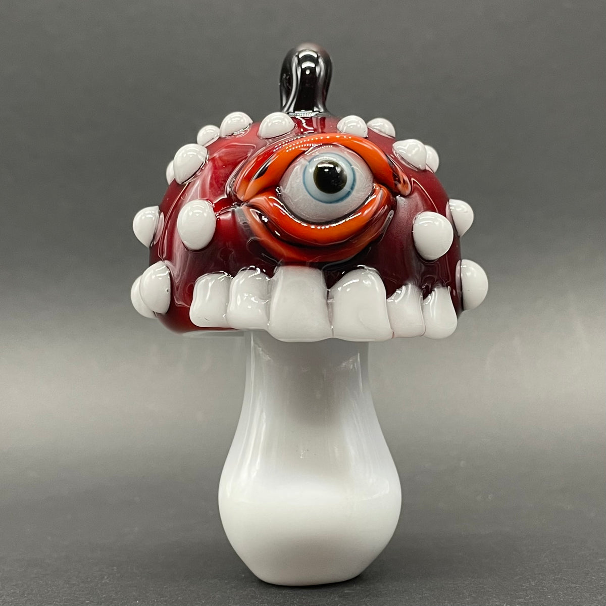 Cyclops mushroom ornament detail view - premium glass art