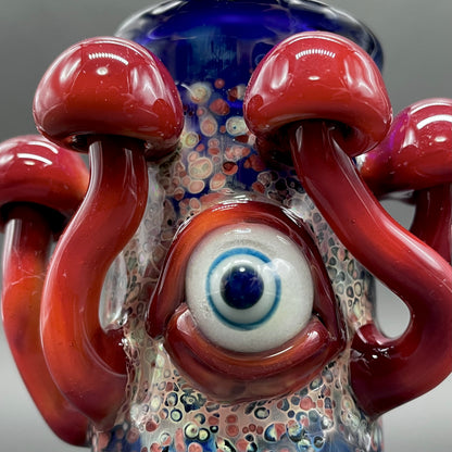 Close-up of Tequila sunrise shot glass - handcrafted glass