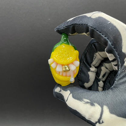 Grinning lemon pendant