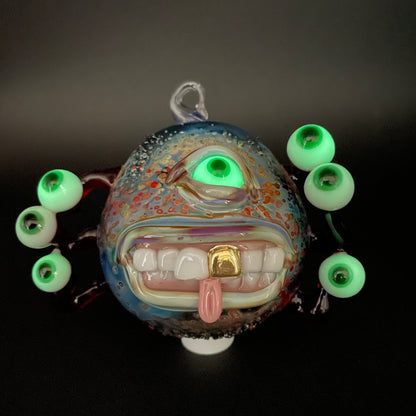 Close-up of Eye stalk monster ornament - handcrafted glass
