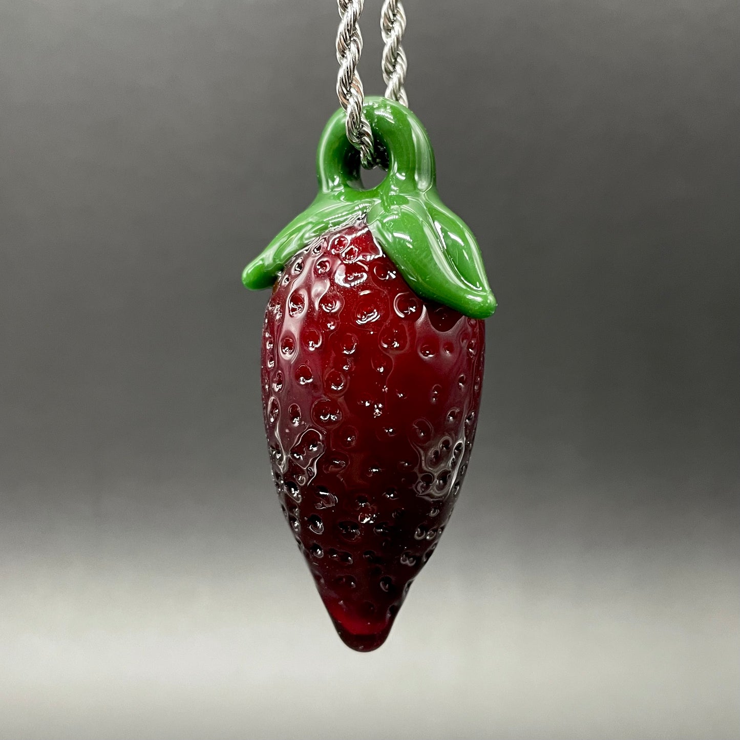 Strawberry pendant detail view - premium glass art