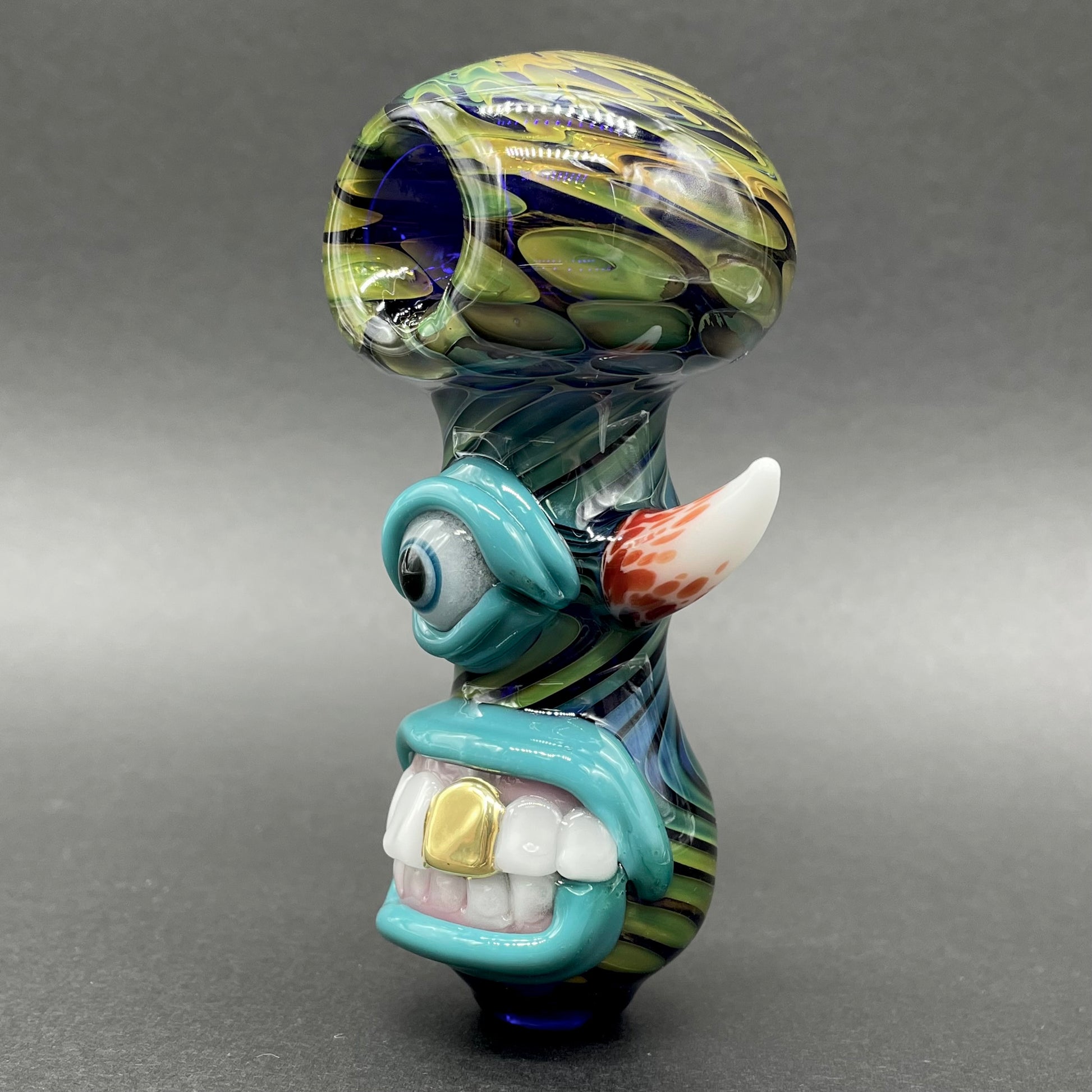 Gold Fumed Cyclops Spoon detail view - premium glass art