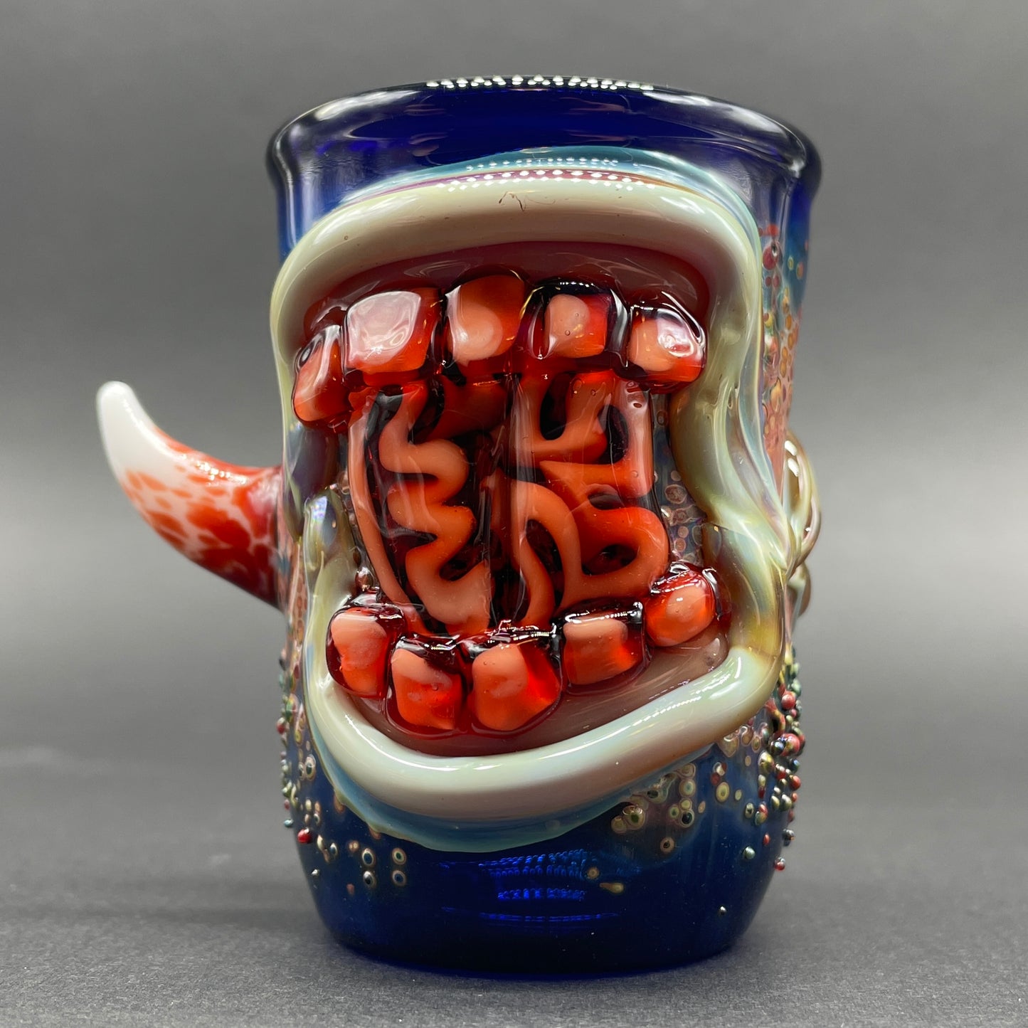 Close-up of Brain eating zombie shot glass - handcrafted glass