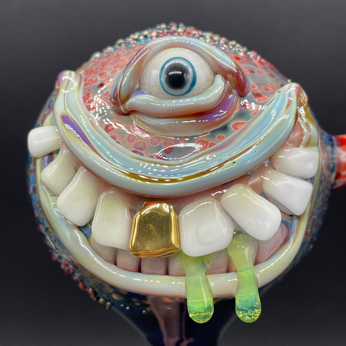 Hand Blown Glass Monster Watering Globe - round cyclops head, blue iris eye, white teeth, gold tooth, teal tongue drips, teal glass stake - Leviathan Glass
