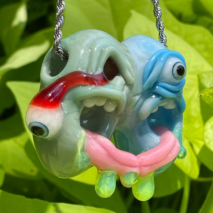 Close-up of Two headaches are better than one - handcrafted glass