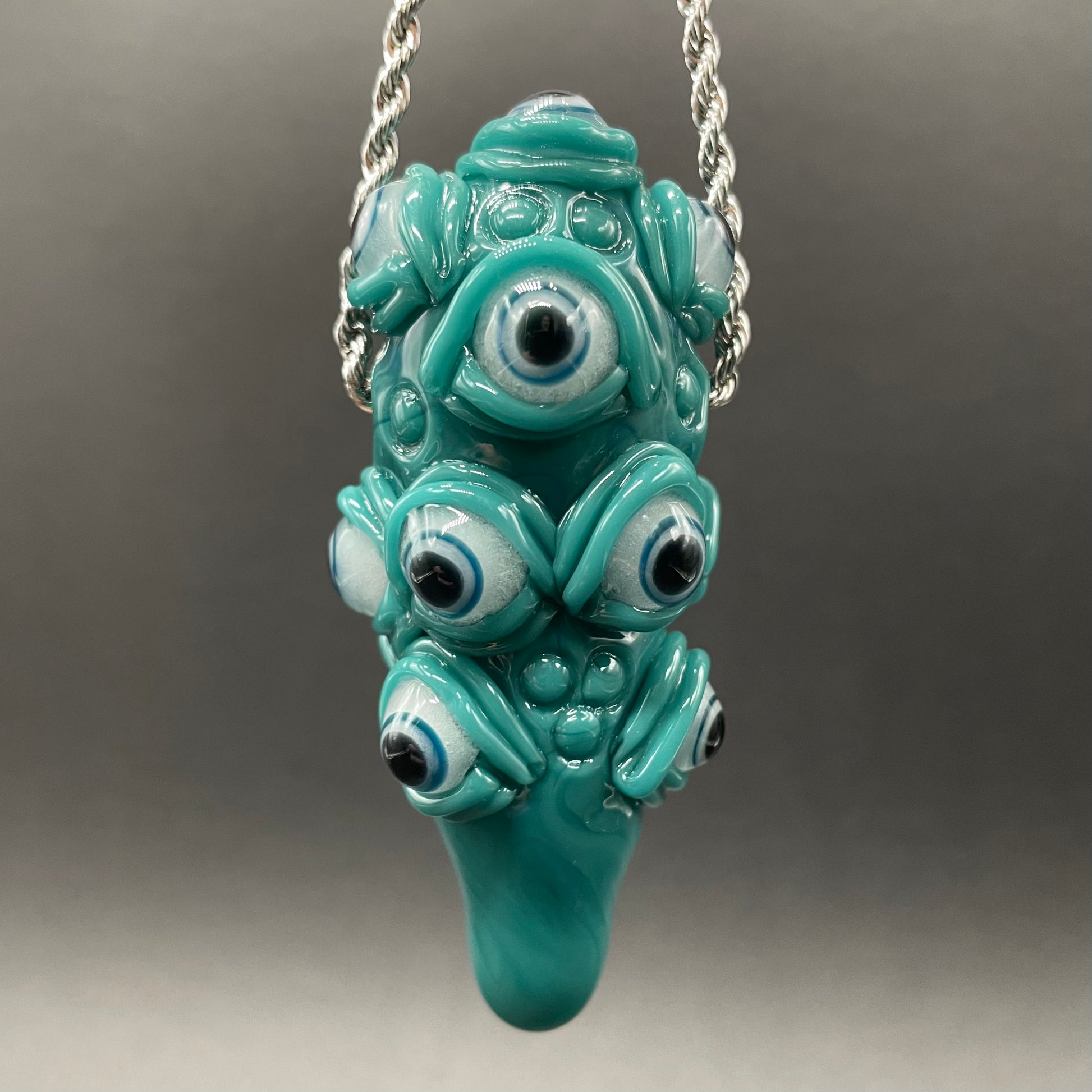 The Never-Blinking One glass effigy pendant by Leviathan Glass - artisan detail