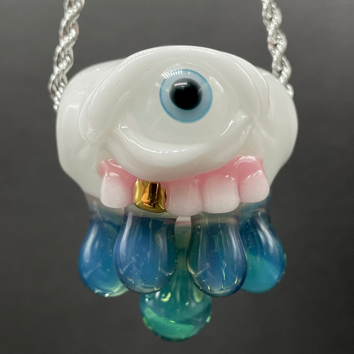 Eye of the storm glass pendant