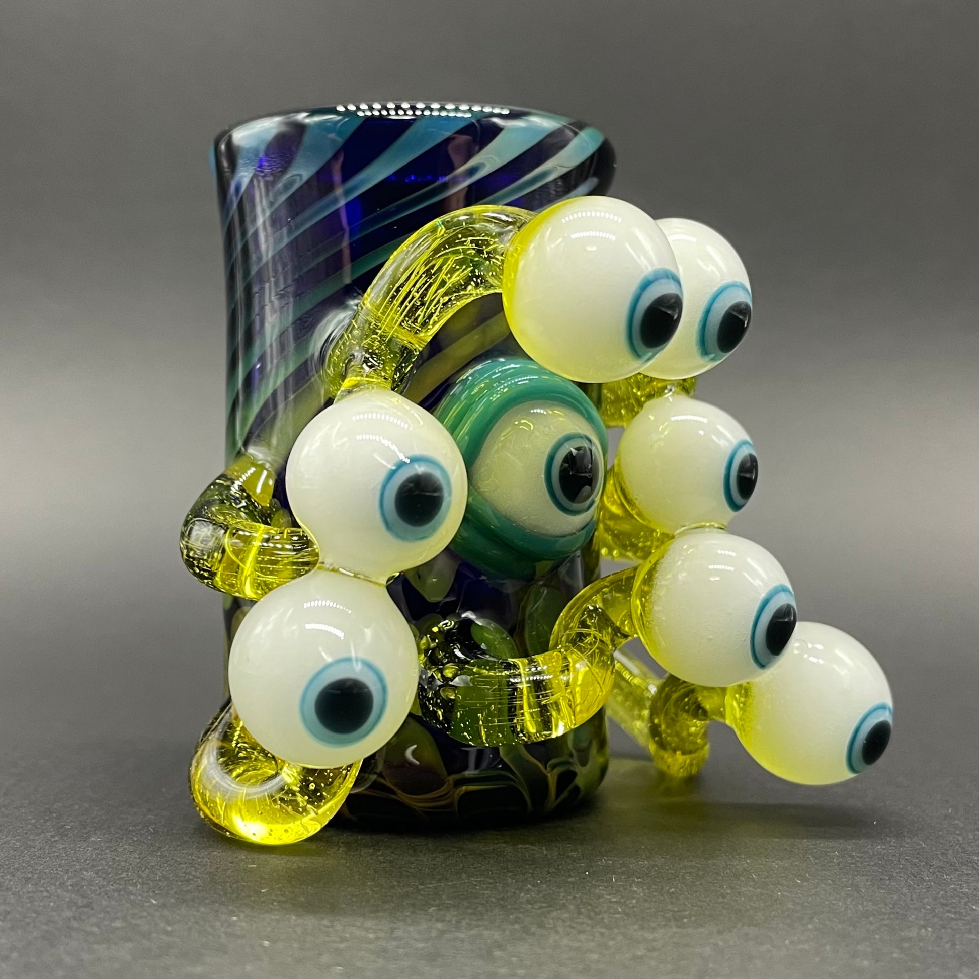 Close-up of Eye stalk shot glass - handcrafted glass