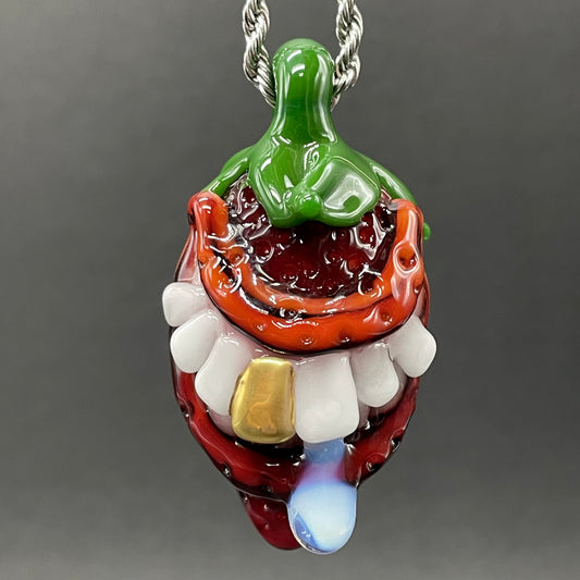 Toothy strawberry pendant