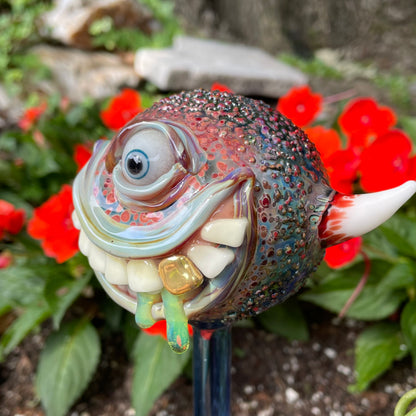 Hand blown glass monster watering globe