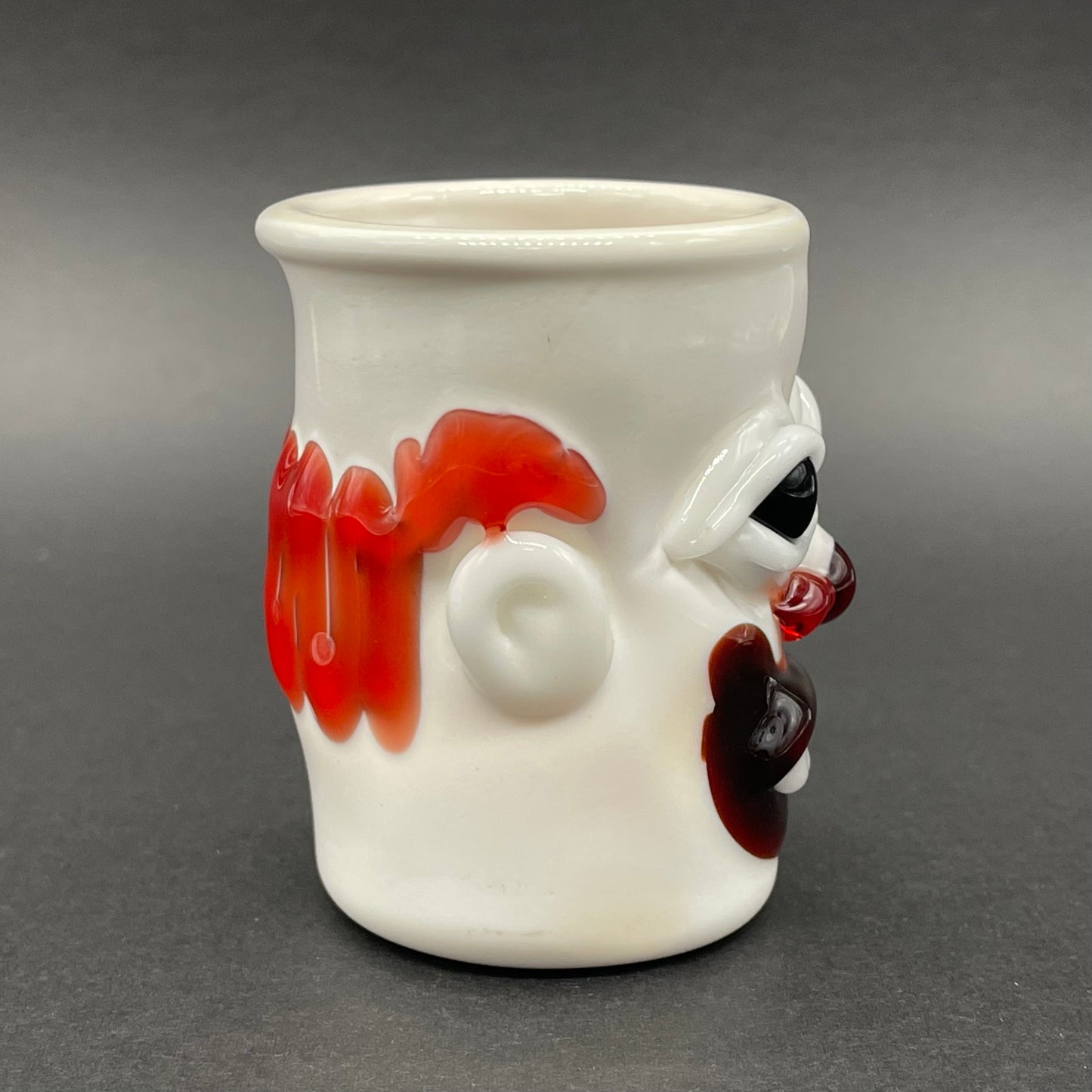 Nightmare fuel Evil clown shot glass by Leviathan Glass - artisan detail