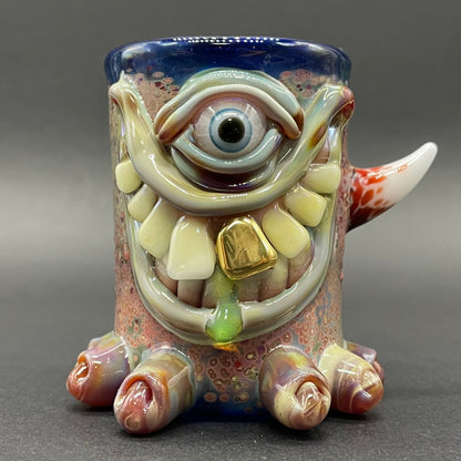 Close-up of Twinkle toes shot glass - handcrafted glass