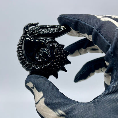 Close-up of Xenomorph pendant - handcrafted glass