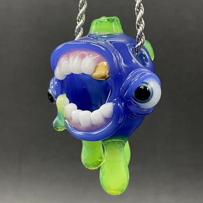 Close-up of Drippy screamer pendant - handcrafted glass