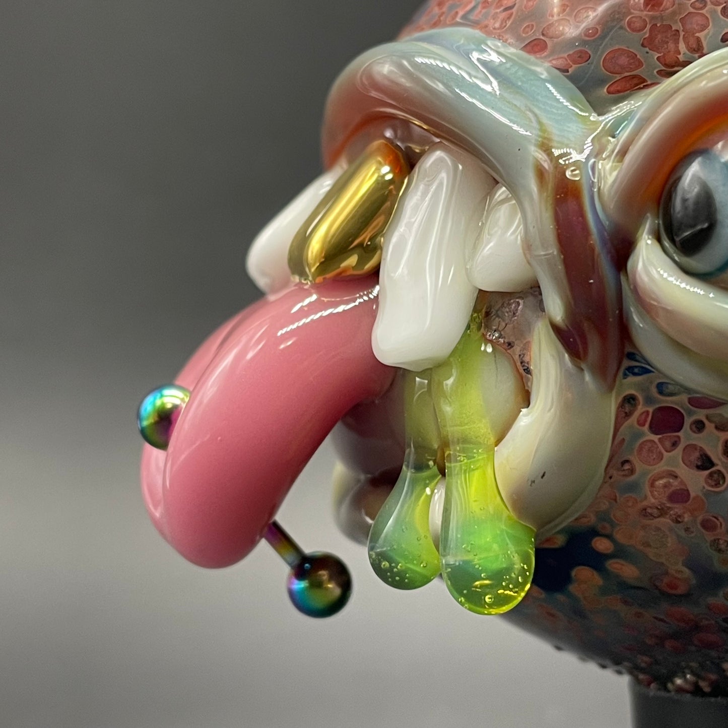 Artisan glass Pierced tongue cyclops ornament - detailed craftsmanship
