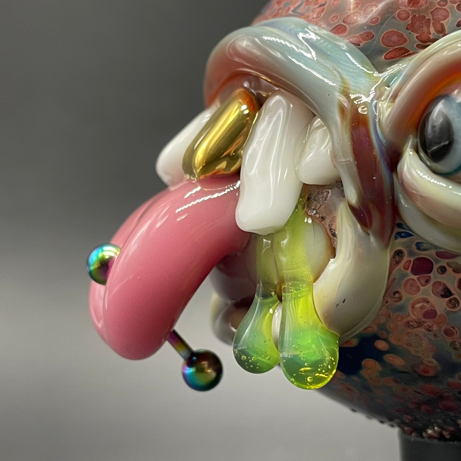 Artisan glass Pierced tongue cyclops ornament - detailed craftsmanship
