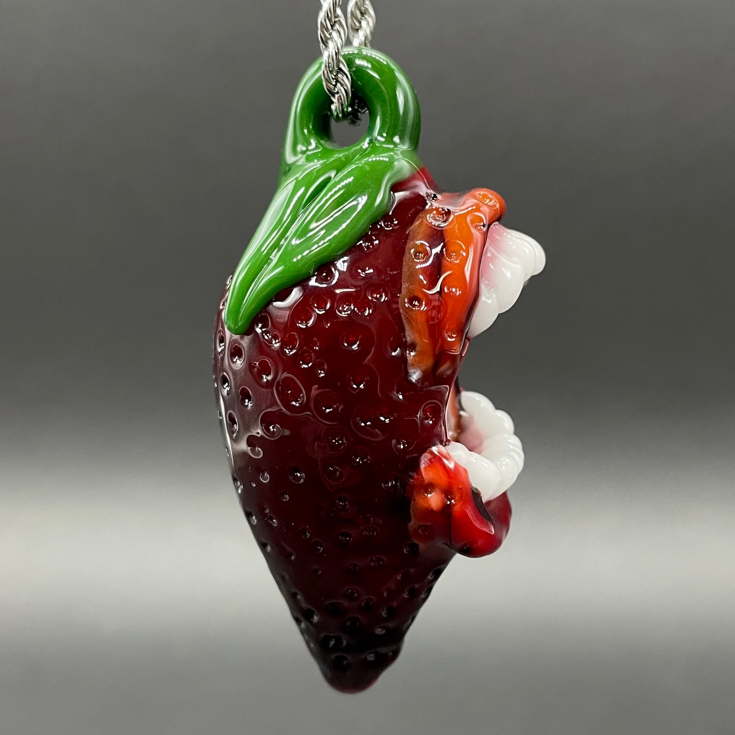 Screaming strawberry glass pendant