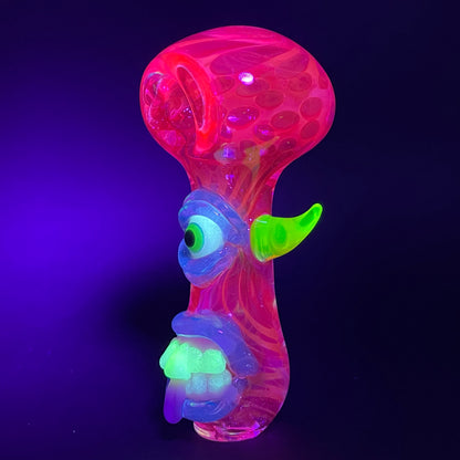 Close-up of UV inside out spoon - handcrafted glass