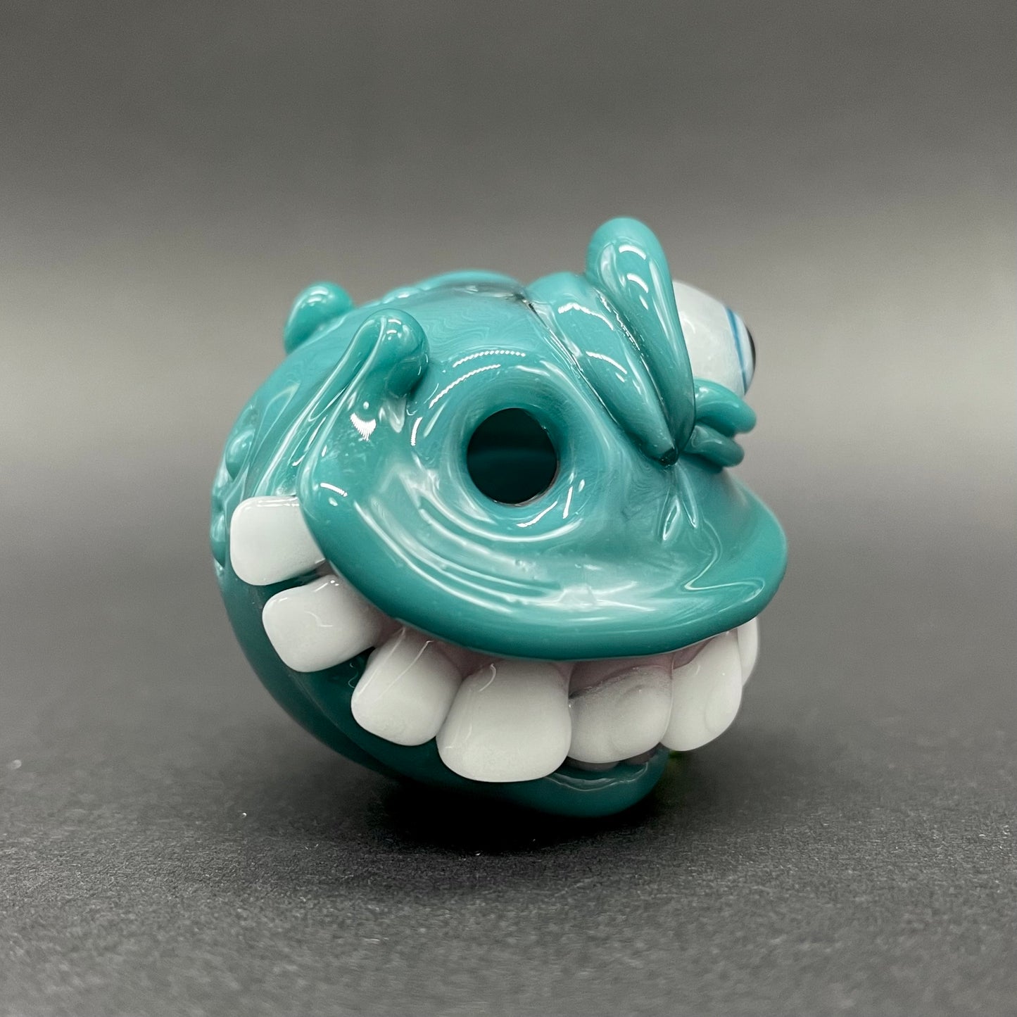 Grinning like a fool glass pendant