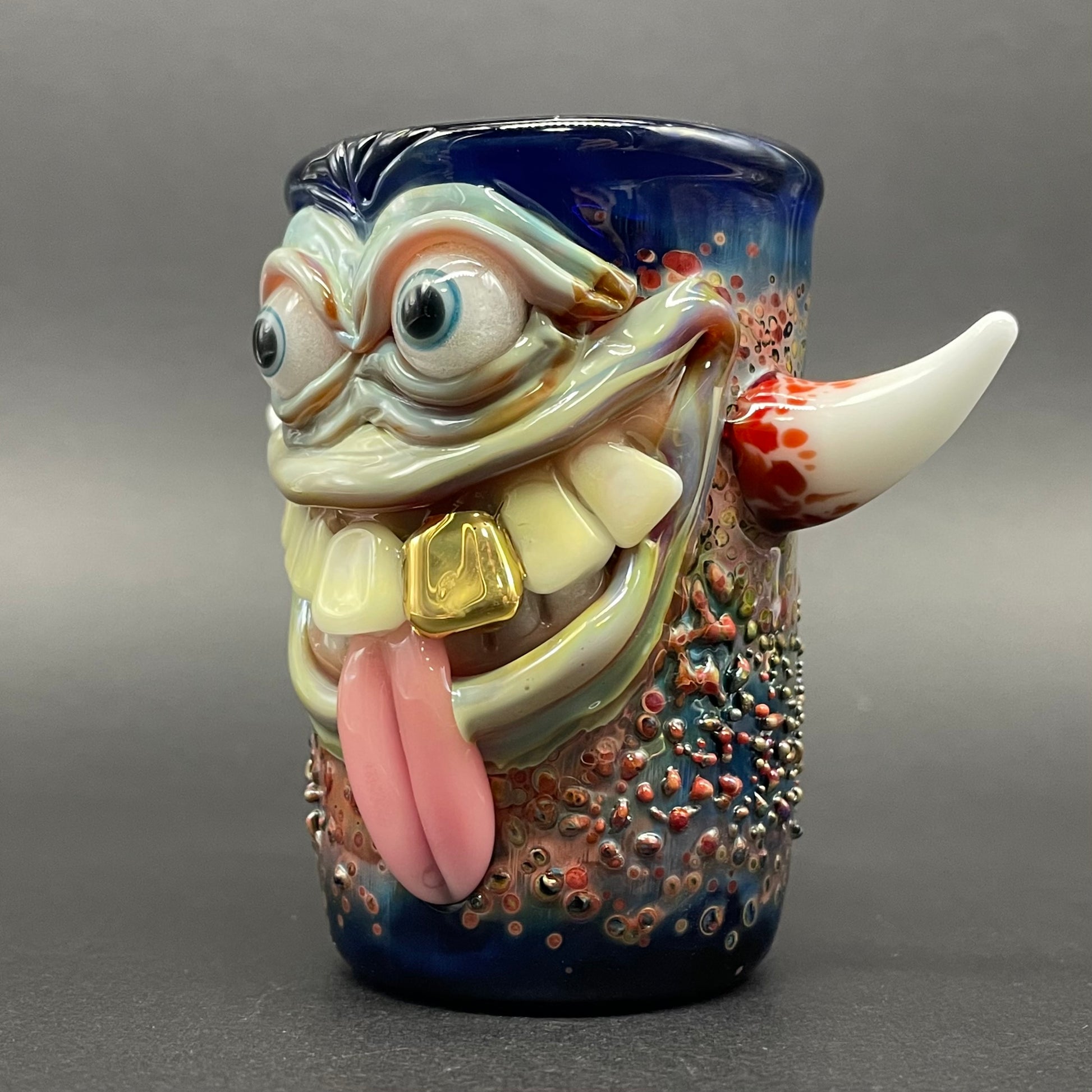 Close-up of Irate pirate shot glass - handcrafted glass