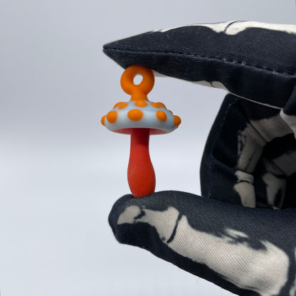 Orange mushroom pendant by Leviathan Glass - artisan detail