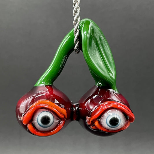 Cherry flavored glass eye pendant