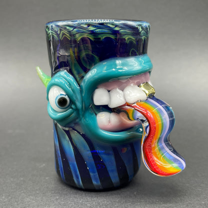 Hand blown kool AID tongue shot glass with gold tooth detail view - premium glass art