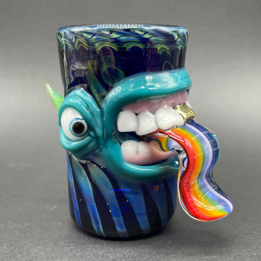 Hand blown kool AID tongue shot glass with gold tooth detail view - premium glass art