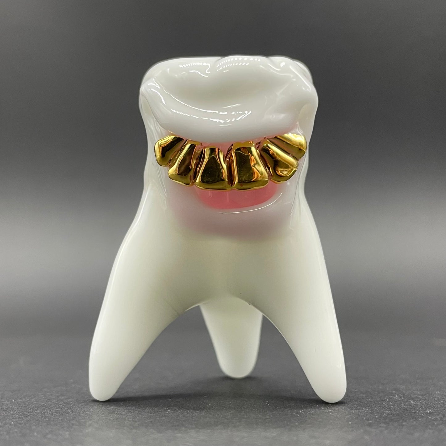 Tooth ache glass pendant detail view - premium glass art