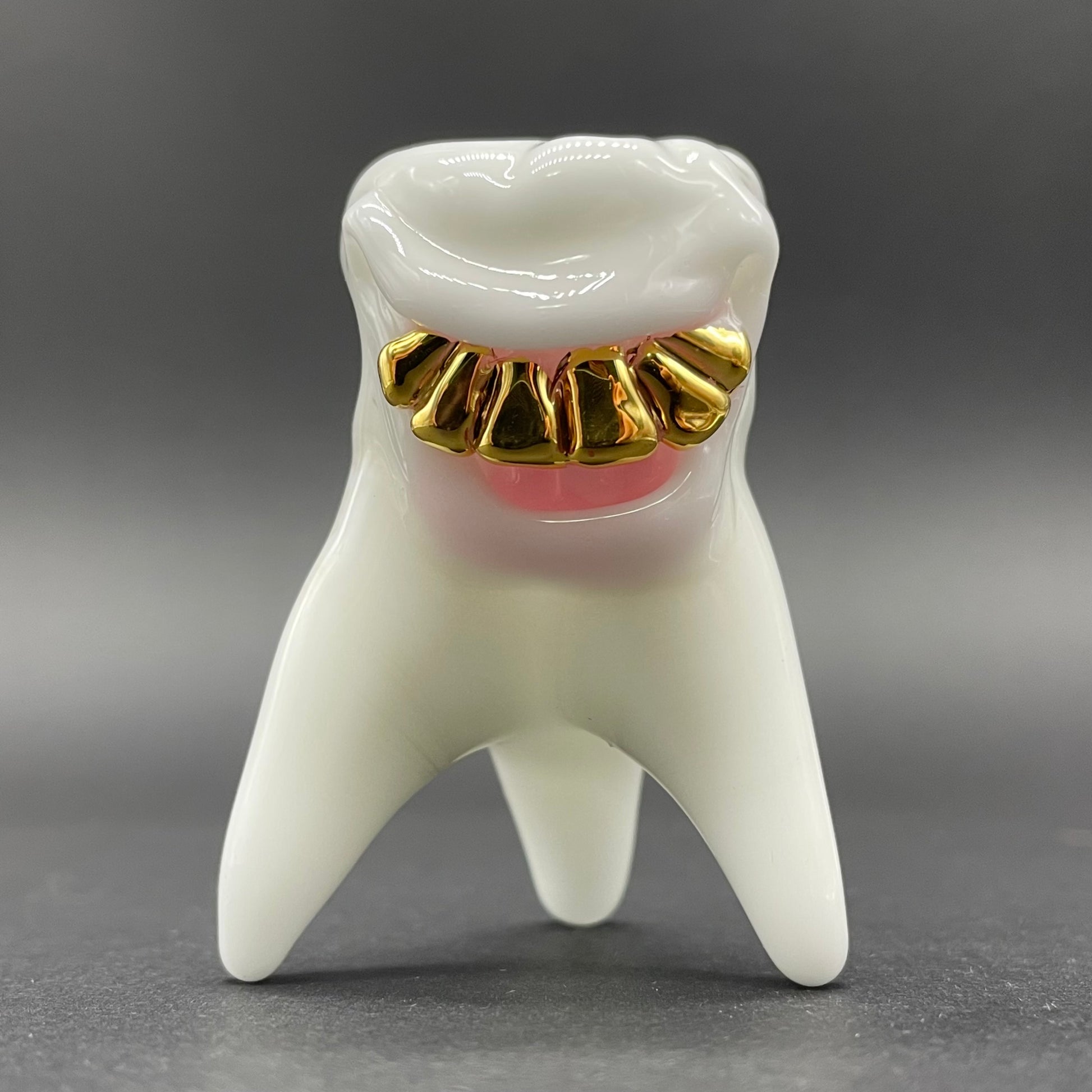 Tooth ache glass pendant detail view - premium glass art