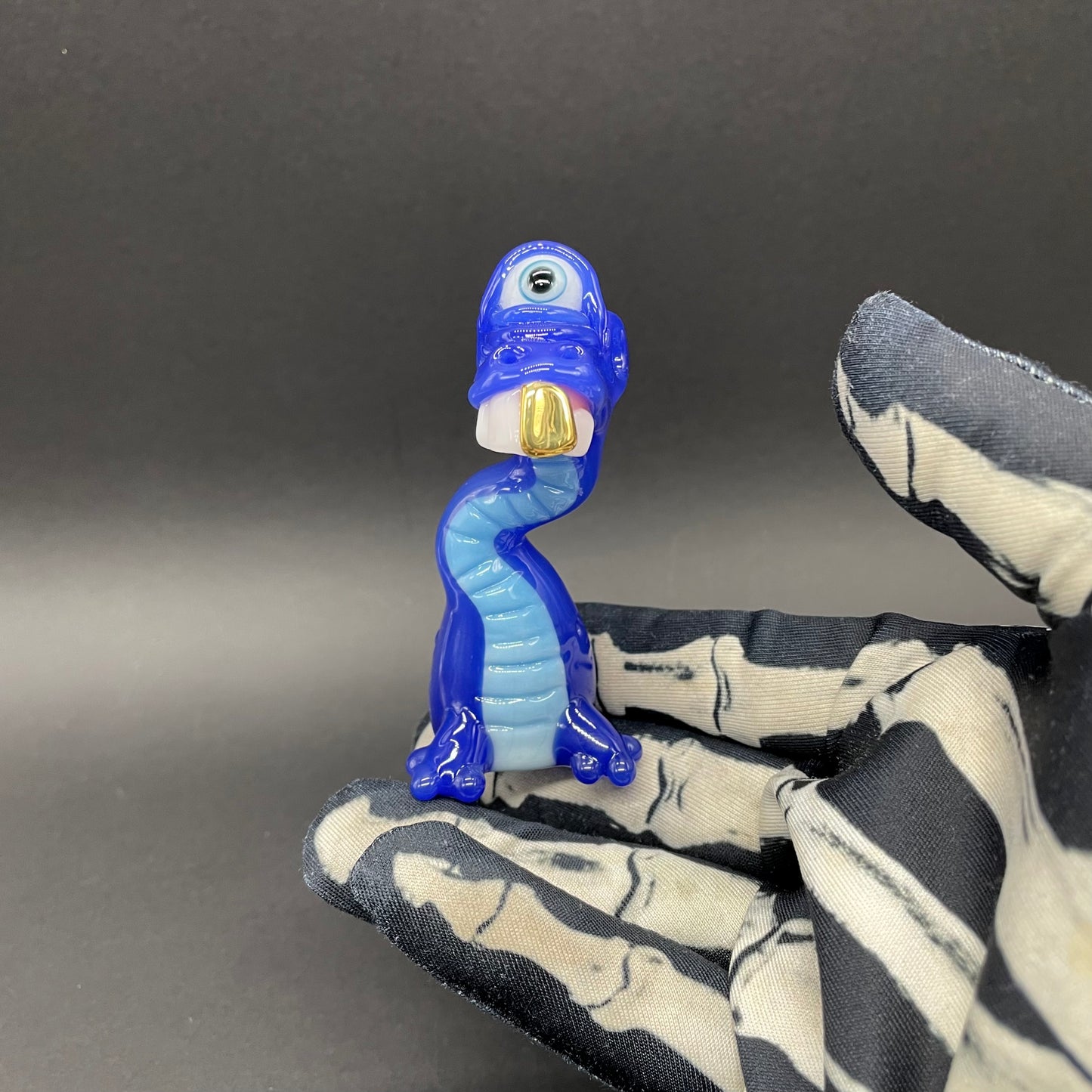Cyclopsasarus glass pendant