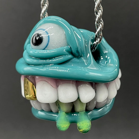 Grinning like a fool glass pendant
