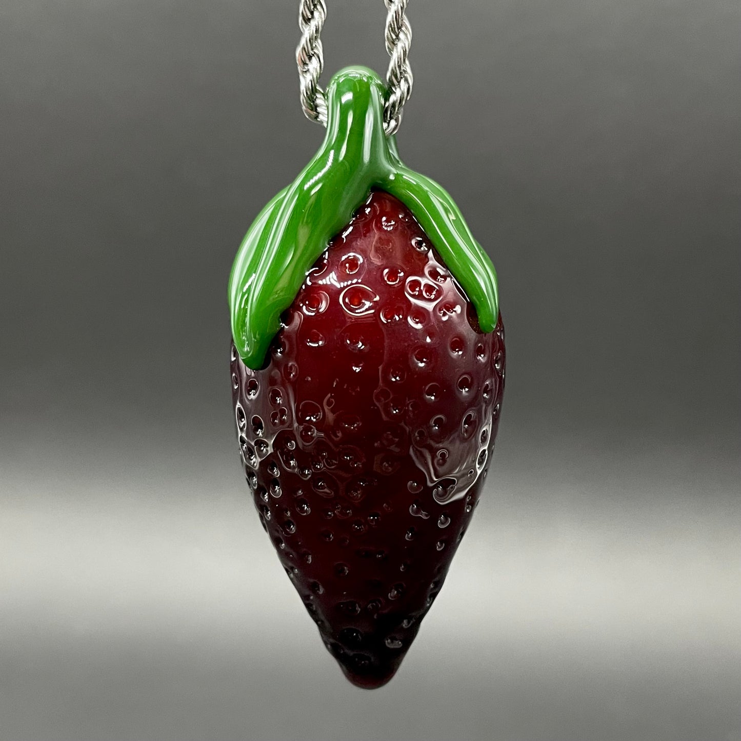 Screaming strawberry glass pendant