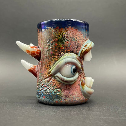 Close-up of Screaming shot glass - handcrafted glass