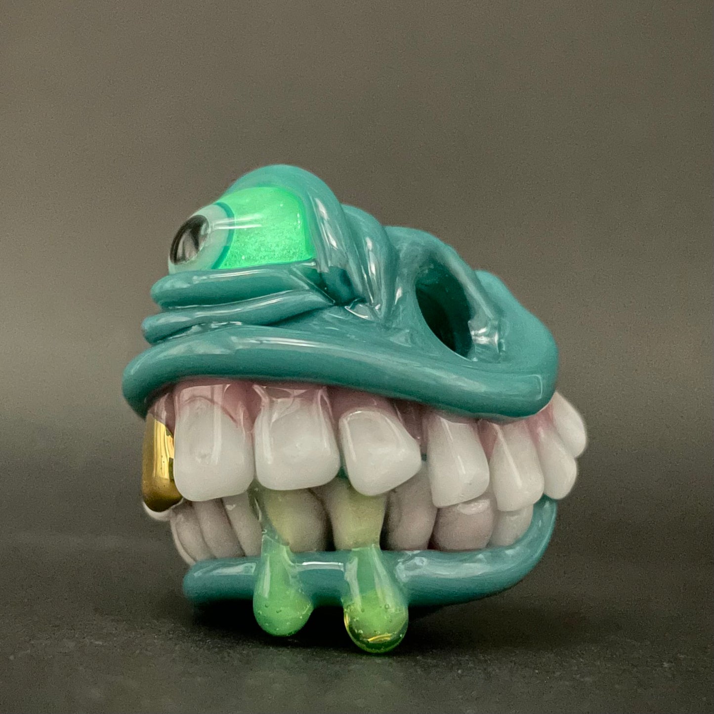 Grinning like a fool glass pendant