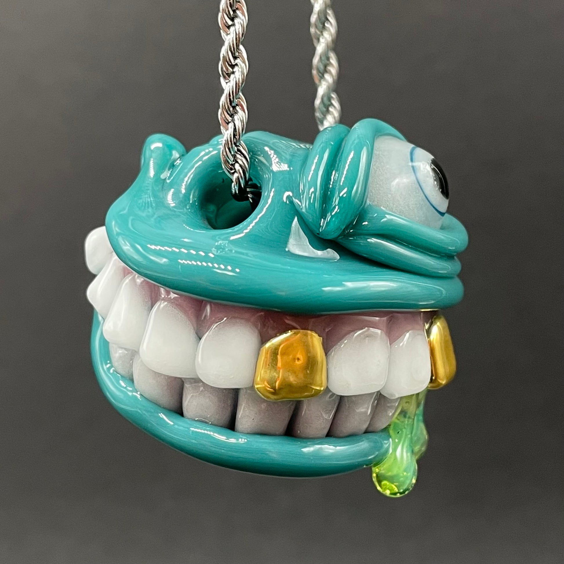 Grinning Like a Fool handblown glass pendant - oversized grinning monster face, white teeth, gold tooth, opal accents, silver rope chain - Leviathan Glass