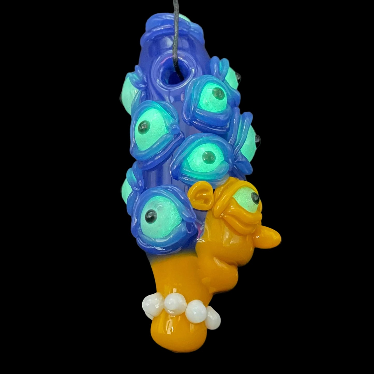 Marge Simpson Mutant handblown glass pendant - yellow Marge Simpson face with towering stack of blue cyclops creatures forming her hair, white pearl beads, silver rope chain - Leviathan Glass