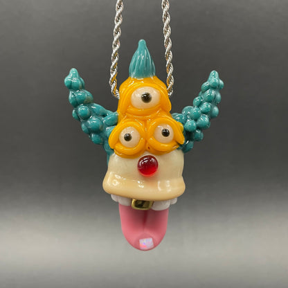Krusty the Clown handblown glass pendant - Simpsons Krusty clown face with third eye, opal tab accent, white teeth, silver rope chain - Leviathan Glass