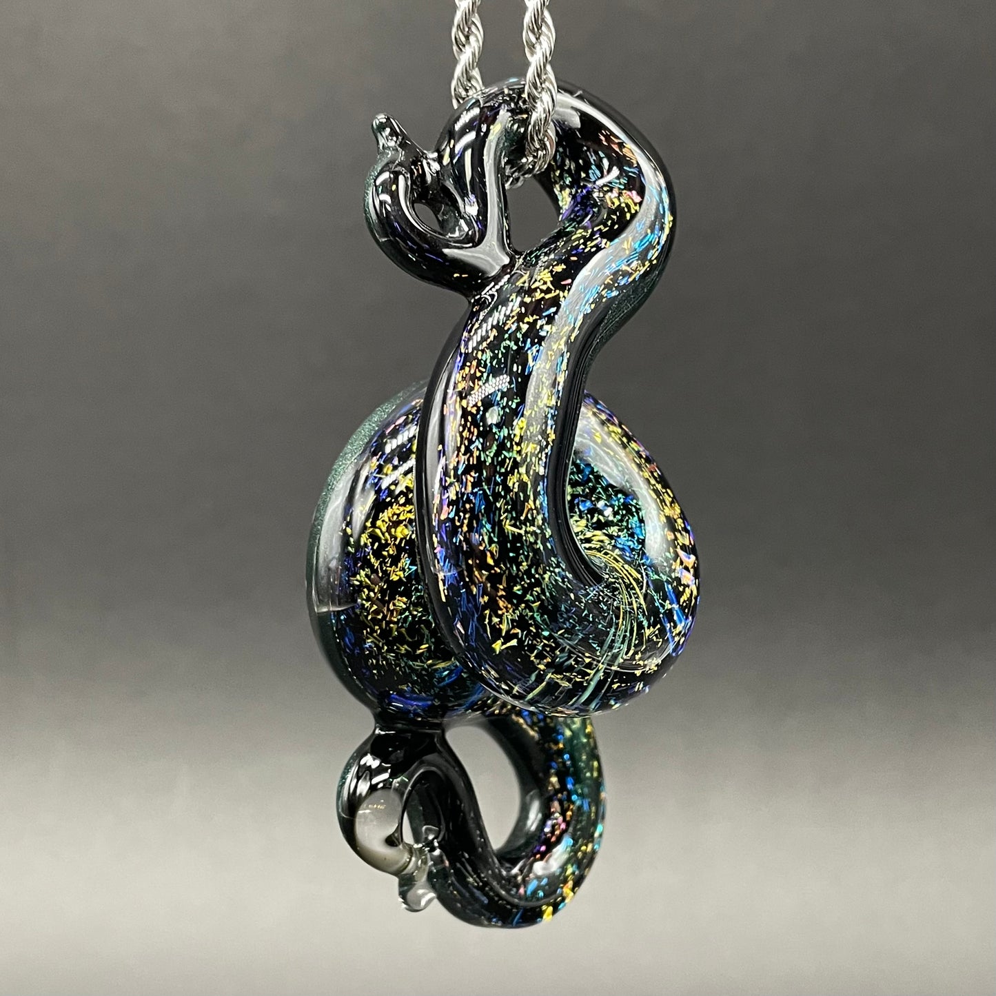 Dichroic rainbow sparkle snake pendant craftsmanship - artisan glass work