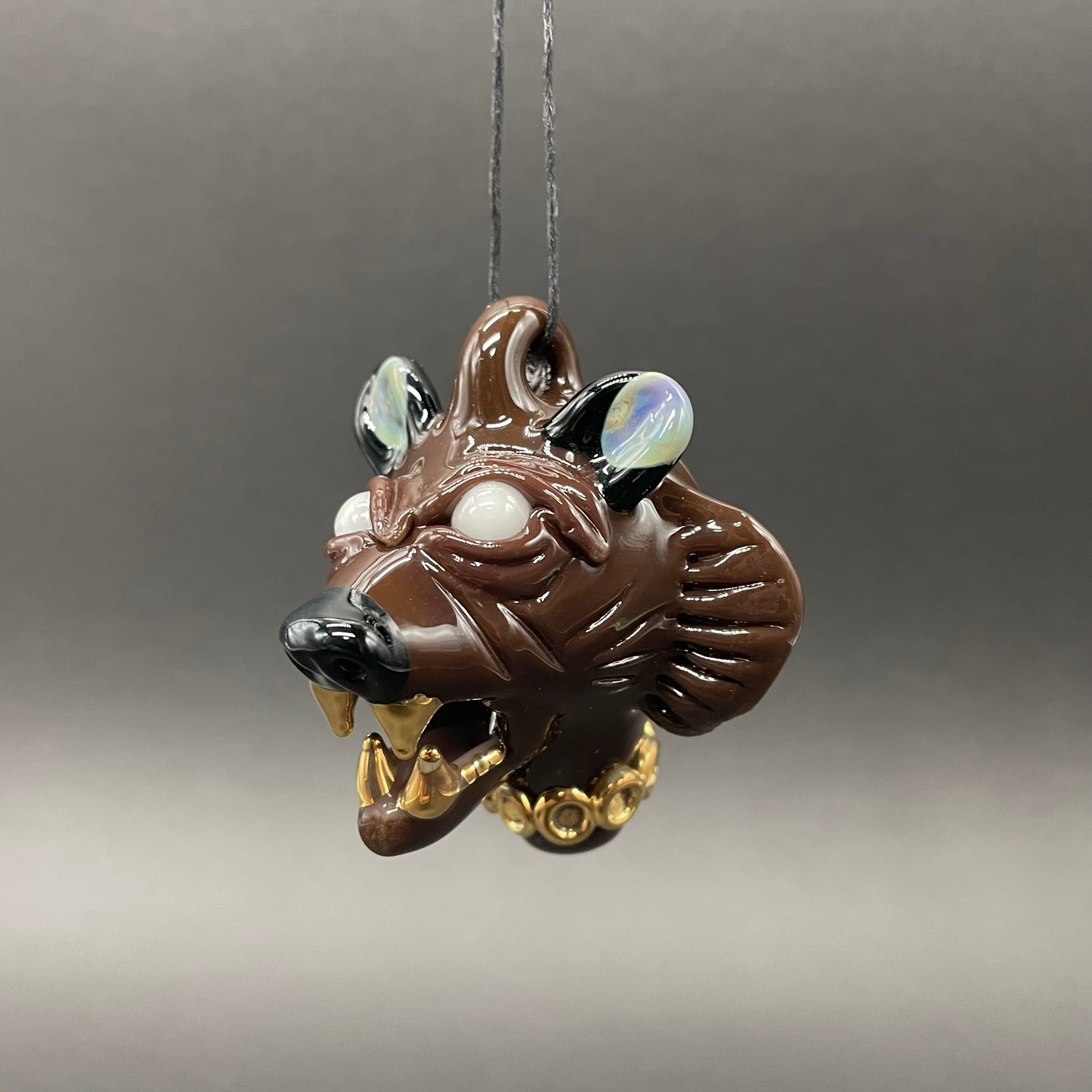 Hand-blown glass blinged out glass grizzly bear pendant by Leviathan Glass